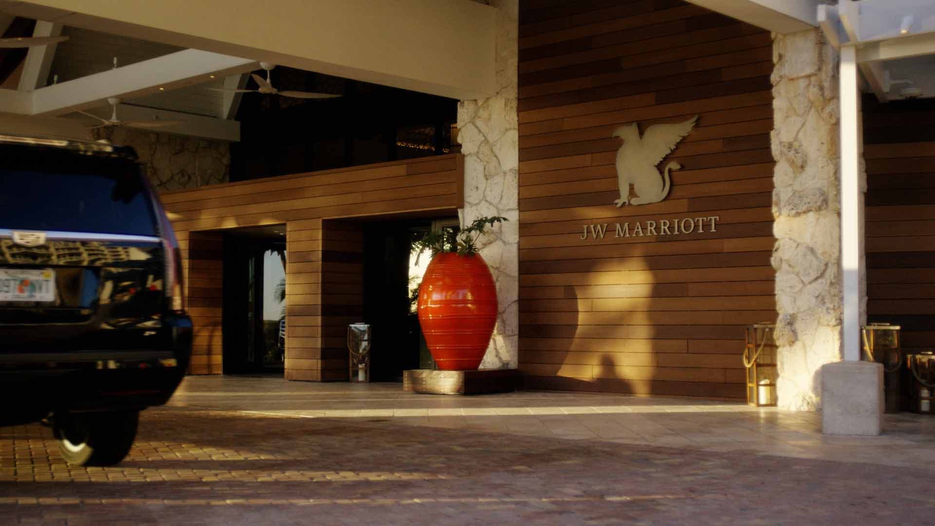 JW Marriott Marco Island entrance signage at golden hour