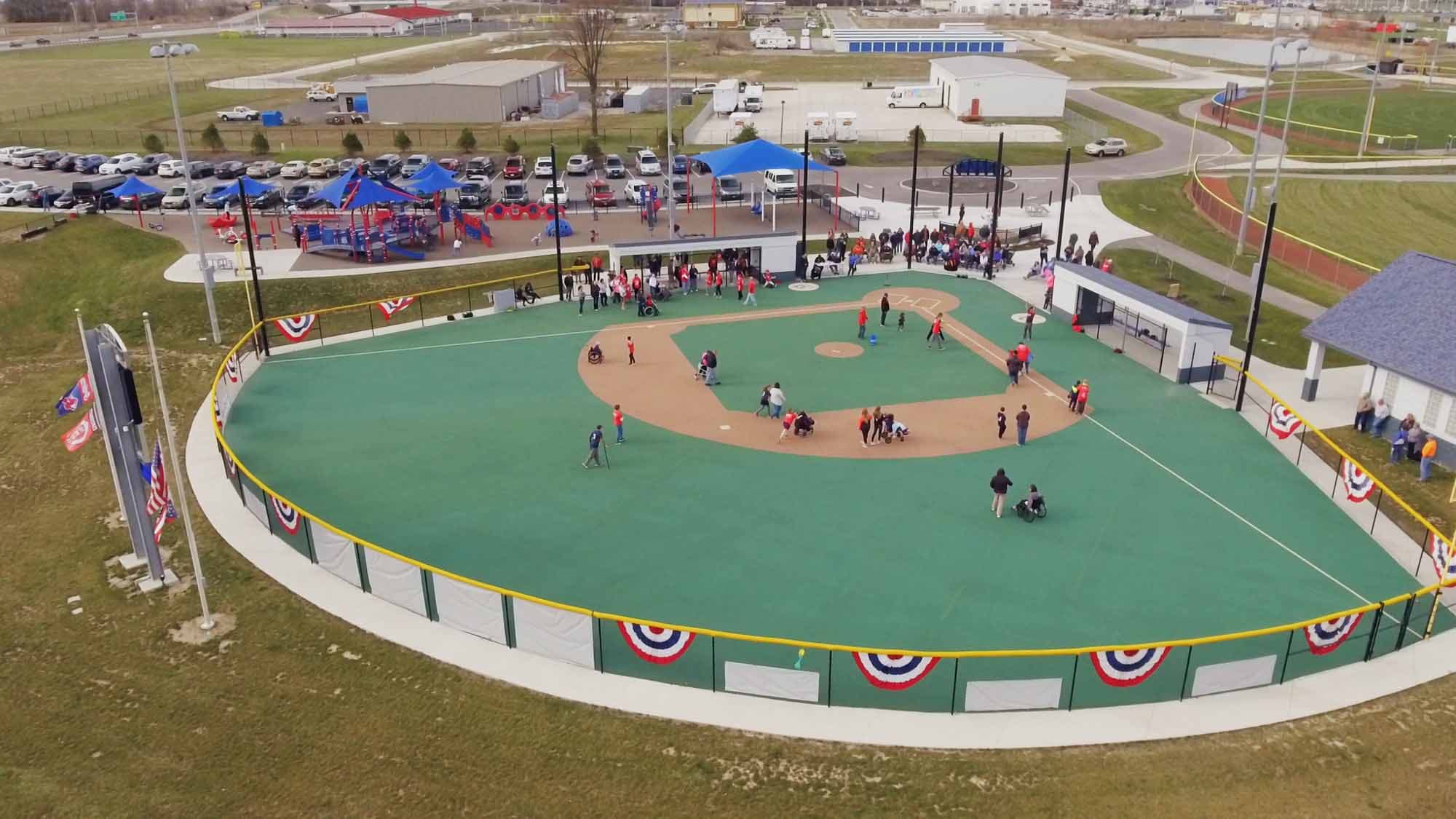 Drone aerial of Miracle Field accessible baseball field on opening day